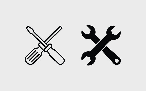 Crossed screwdrivers and wrenches vector icon set featuring linear screwdriver and solid spanner symbols for repair service and maintenance