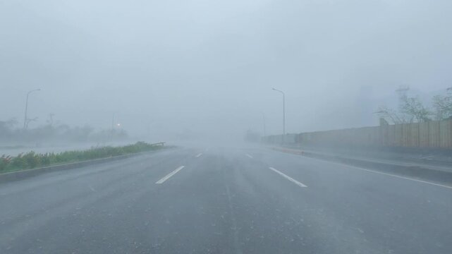 Dangerous Driving Conditions As Hurricane Wind And Rain Hit City