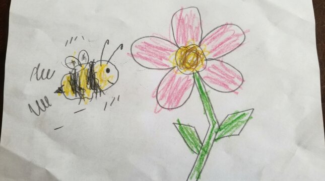 Children drawing of striped bumblebee flying near pink flower.