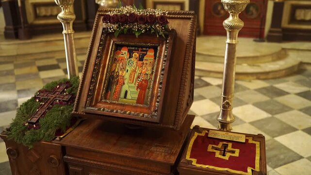 Orthodox icon on analogion with roses, Church of St. Nicholas, Kotor Montenegro