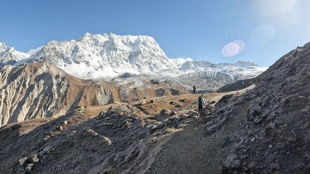 Footage of beautiful landscape while tourist ascending to Tsergo Ri peak (5,033 m) a challenging but rewarding peak in Nepal's Langtang National Park.