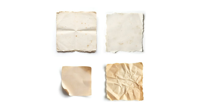 Collection of four vintage aged paper scraps with torn edges and textures isolated on white background