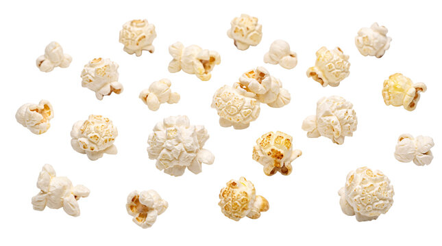 Assorted puffed popcorn kernels scattered on isolated on png transparent background