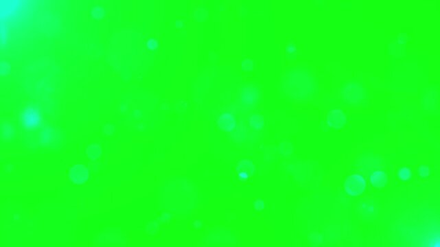 Vibrant green screen with falling blue particles motion background animation element chroma key