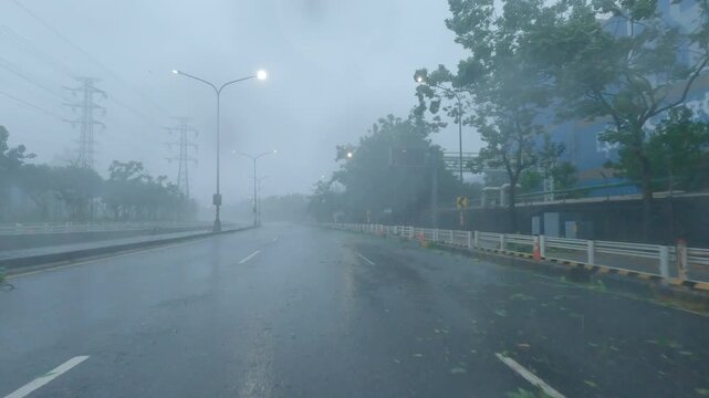 Hurricane Force Wind And Driving Rain Sweep Across City Highway