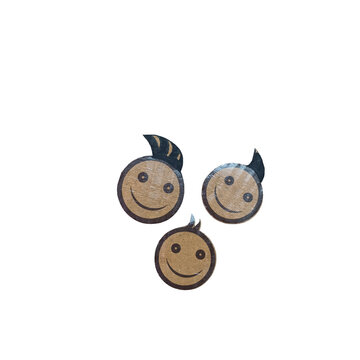Three circular brown cardboard cutouts featuring hand drawn smiling faces with hair tufts arranged on a white background, for craft activities isolated on a transparent background