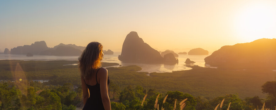 Woman Looking at Phang Nga Bay Sunrise from Samet Nangshe Viewpoint