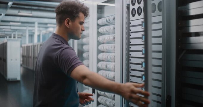 IT Specialist Holds Digital Tablet and Uses Keys to Open Glass Server Cabinet Door Inspect Cooling Fans and Hardware Components. System Diagnostics, Physical Maintenance Ensure Optimal Server Airflow.