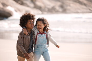 Laughing, walking and love with children at beach for bonding, siblings and weekend break. Family...