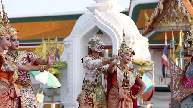Traditional Thai Khon Dancers Performing in Ornate Costumes at Temple