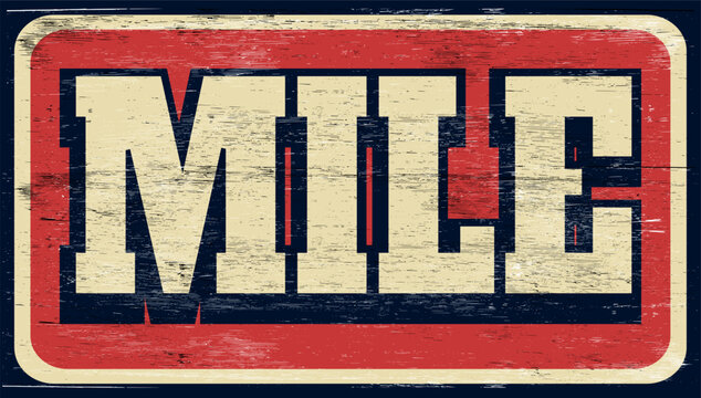 Aged and worn mile sign on wood