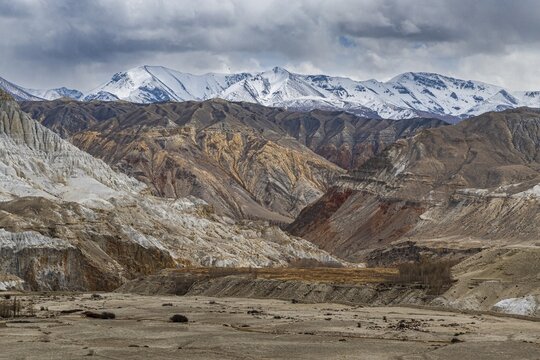 Vast landscape with the snow-covered mountains around Lo Manthang, Kingdom of Mustang, Nepal