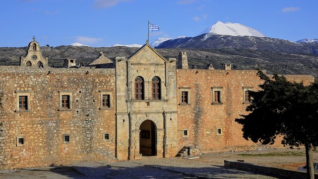 Main entrance, national flag, forecourt, tree, Ida massif, Psiloritis, snow-capped mountain, Arkadi, Orthodox monastery, national monument, Rethimnon province, Crete, Greece