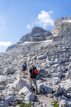 Two mountaineers on a hiking trail on the Grost&eacute; Plateau, Brenta Mountains, Parco Naturale Brenta-Adamello, Trentino, Italy