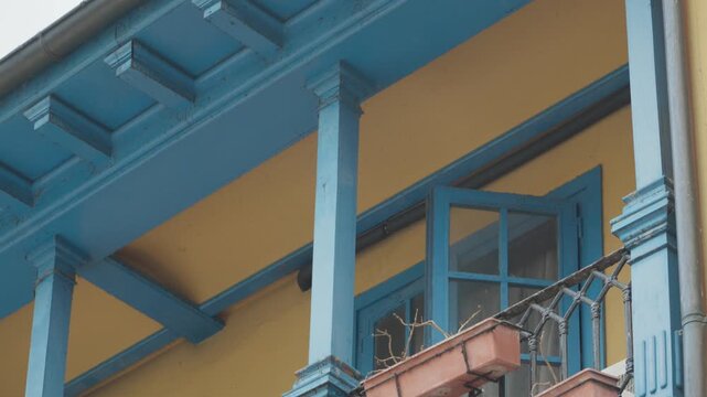 Colorful residential building facade with traditional Asturian architecture details in Oviedo, Spain