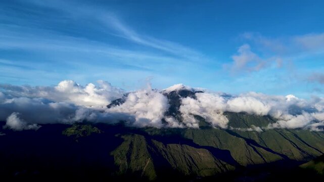Scenic Andean Mountain Ridge in Ecuador with Blue Sky, White Clouds, Green Slopes and High Altitude Nature Travel Landscape Background