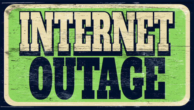 Aged vintage internet outage sign on wood