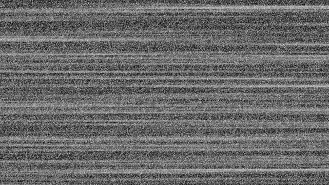 Analog vhs static noise overlay with signal interference distortion, Noise on a old TV screen. tv screen noise glitch effect. Minimal dark film texture with subtle horizontal static lines 