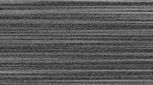 Analog vhs static noise overlay with signal interference distortion, Noise on a old TV screen. tv screen noise glitch effect. Minimal dark film texture with subtle horizontal static lines 