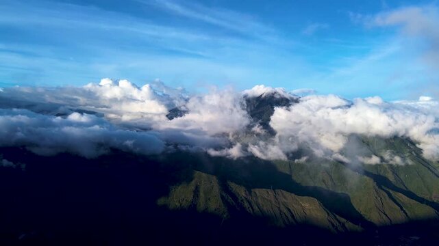 Aerial View of Green Andean Mountain Slopes and Low Clouds in Ecuador, Scenic Highland Landscape, Volcano Region and Nature Travel Background