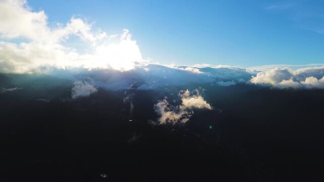 Sunset Over Ecuador Andes Mountains with Cloud Layers, Forested Slopes, Bright Sky and Dramatic High Altitude Nature Travel Landscape