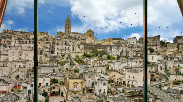 Medieval Town Of Matera Atop Rocky Outcrop In The Region of Basilicata, Southern Italy. 4K footage of the beautiful town of Matera (Sassi di Matera) in Basilicata, UNESCO WORLD HERITAGE SITE. 
