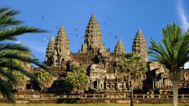 Angkor Wat Temple at Sunrise in Siem Reap Cambodia. Angkor Wat Temple Surrounded by Tropical Jungle in Cambodia. Scenic Daytime View of Angkor Wat Ancient Temple Cambodia. Unesco World Heritage Site