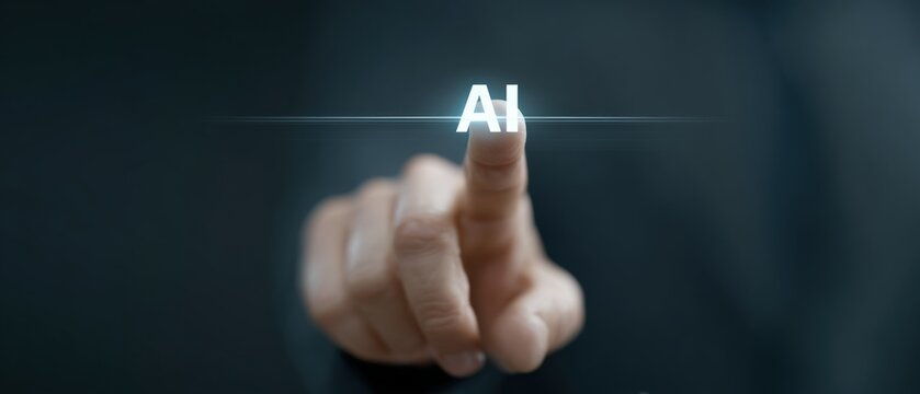 A hand reaching out to engage with advanced artificial intelligence technology in a dimly lit setting showcasing a blend of human and machine interaction