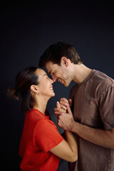 Fototapeta premium Happy couple enjoying in their love face to face.