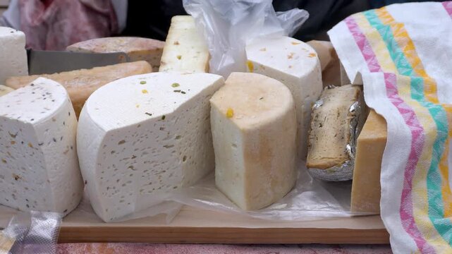 Variety of Cheese on Display at Cheese Shop