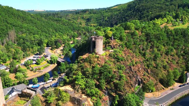 September 10, 2026 - Scenic aerial footage of Esch-sur-S&ucirc;re castle tower and village in the beautiful Luxembourg Ardennes valley.