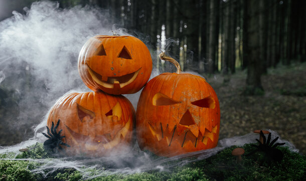 Spooky and scary Halloween themed image in a dark forest with Jack-o-lanterns.
