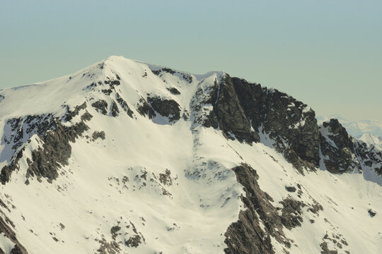A forbidding, snow-capped alpine peak Monte Masoni. Orobie Alps, Province of Bergamo, Lombardy, Italy, Europe