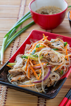 Stir-fried glass noodles with pork.