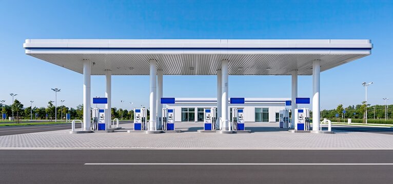 Modern gas station in Bac, Serbia with clean fuel pumps and clear signage on a sunny day.