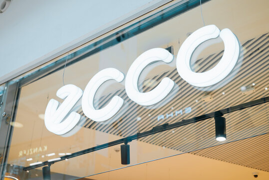  sign of the ECCO store is prominently displayed at the entrance of a shopping mall, highlighting its contemporary design