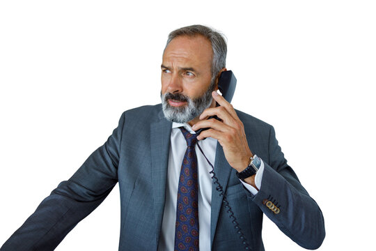 Businessman communicating on telephone in formal wear