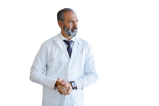 Mature male doctor wearing white coat looking aside