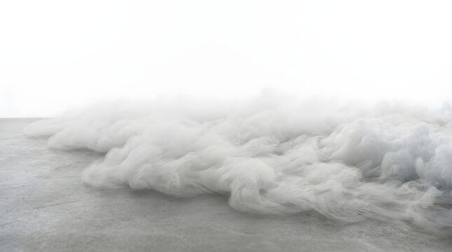 White smoke or fog rolling over a smooth grey floor surface