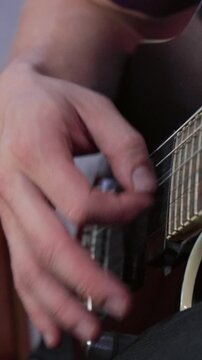 Guitarist Fingerpicking Electric Guitar Strings Close Up