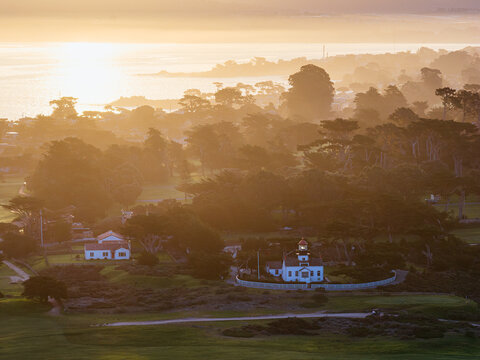 Point Pinos Lighthouse at sunset overlooking Monterey Bay, California, USA