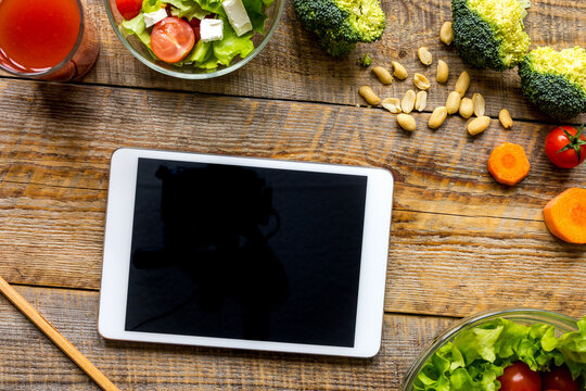 concept diet and tablet with vegetables mock up