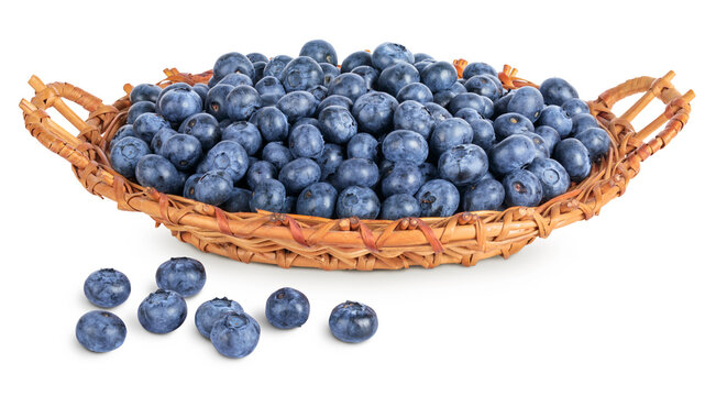 blueberry in wicker basket isolated on white background