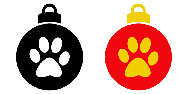 Decoraci&oacute;n para &aacute;rbol de navidad. Icono con dibujo sencillo de una bola de navidad decorada con una pisada de gato o perro, en versi&oacute;n de color negro y en versi&oacute;n de colores rojo y amarillo