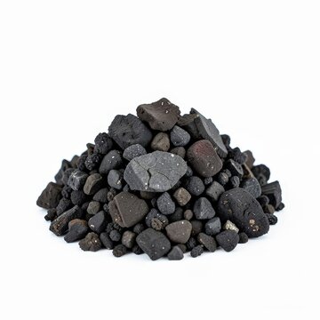 Small mound of irregular biochar charcoal pieces isolated on white background for soil enrichment and sustainable agriculture