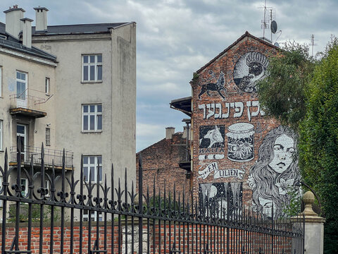 Krakow, Poland, July 26, 2025: Krakow's Old Town. One of the tenement houses with a ruined but interesting fasade in Kazimierz (the former Jewish district) in Krakow, Poland