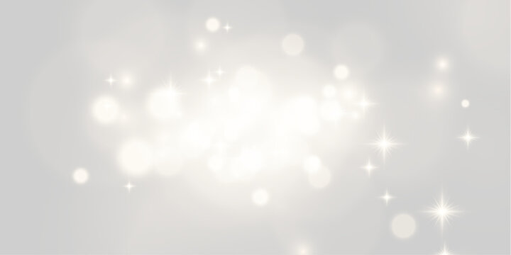 Soft golden bokeh lights create a dreamy glowing effect. The lights vary in size and are scattered unevenly across a dark background. This image is perfect for festive or romantic visual.