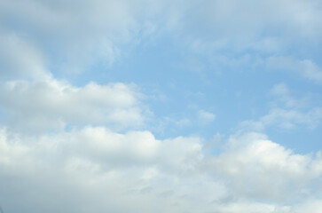 Fototapeta premium Blue Sky with Soft White Clouds and Natural Cloudscape Background