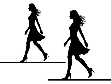 Black silhouettes of women walking in dresses on white background