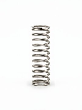 Metal compression coil spring standing on white surface